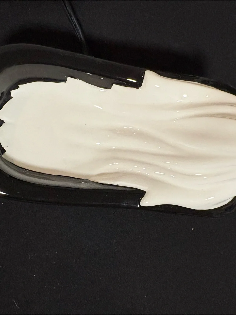 Scentsy wax warmer Ceramic Black & White Ghost soaking in a Bathtub